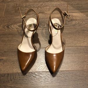 Brown heels, low heel.